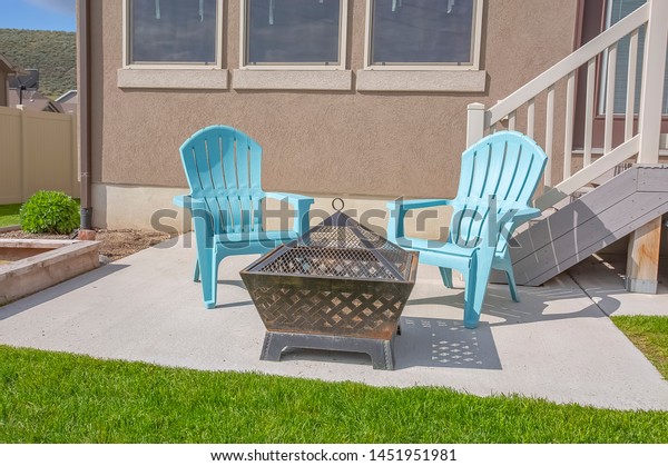 Square Fire Pit Blue Plastic Chairs Stock Photo Edit Now 1451951981