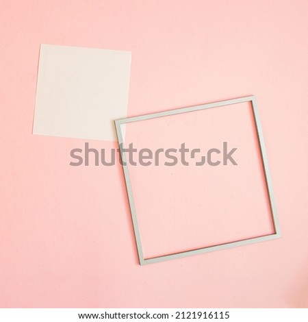 Square frame and Square leaflet mock up blank template design idea. Square frame mockup against pastel pink background. Copy space templates designs for message layout.