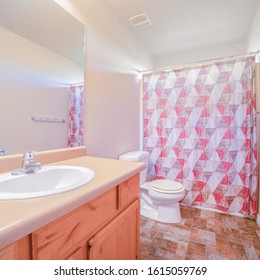 Square Frame Neat Clean Bathroom With Closed Shower Curtain