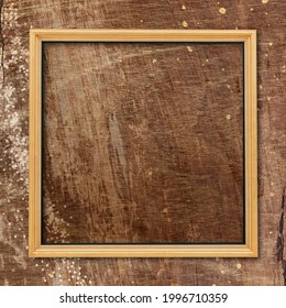 Square frame on plain wooden texture background