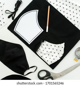 square framing of the image, top view of pieces of fabric, scissors and templet to make a protective mask