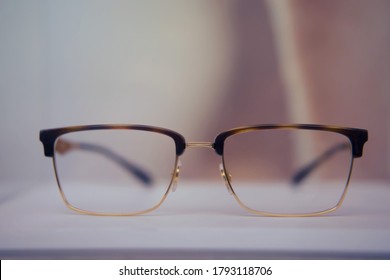 Square Glasses With Brown Frames Close Up On A Store Shelf