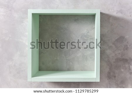 square green wooden wall isolated on gray concrete wall with copy space. Product display template Stock photo © 