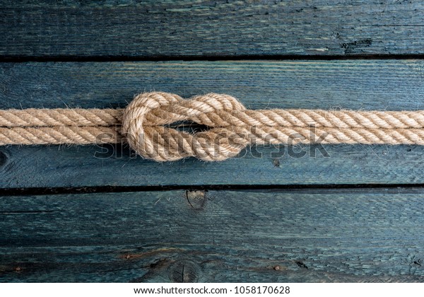 Square knot. Nautical rope\
knot