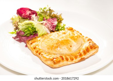 Square Meat Pie With Salad On White Plate 