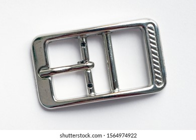 Square Nickel-plated Buckle With A Flat Tongue On A White Background. Metal Hardware For The Manufacture Of Belts.