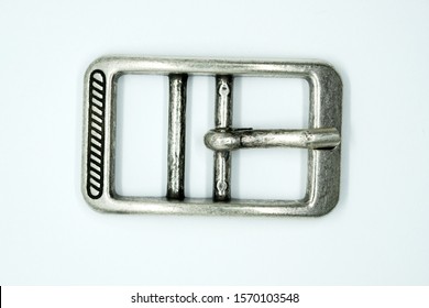 Square Nickel-plated Buckle With A Flat Tongue On A White Background. Chrome Metal Fittings Hardware For The Manufacture Of Belts.