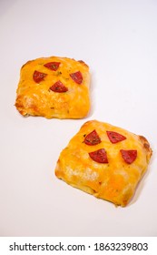 Square Pepperoni  Pizza On Plain Background