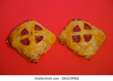 Square Pepperoni  Pizza On Plain Background