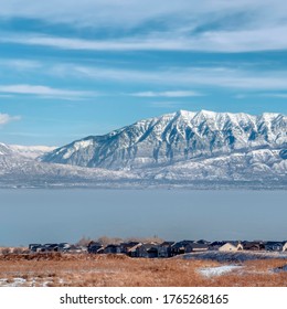 Square Picturesque Wasatch Mountains And Utah Lake Under Cloudy Blue Sky In Winter