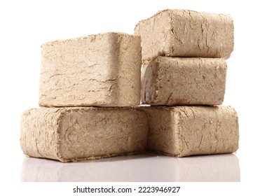 Square Sawdust Briquettes - Compressed Biomass Wood Fire Logs Isolated On White Background