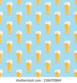 Square seamless pattern of large beer glass full of beer with foam on blue background.