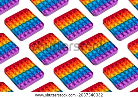 Square shape isometric pattern of silicon toy for kids. Pop it fidget toy isolated on white background. Simle dimple toy. 