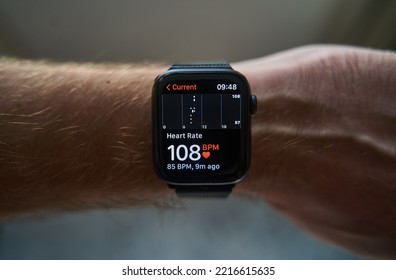 A square smartwatch on a man's hand close up. Heart rate measurement on watch. High quality photo