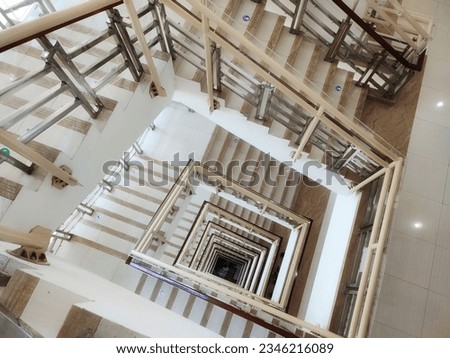 Square spiral stairway viewed from above