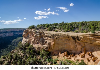 Square Tower House In Mesa Verde National Park With Cliffs In Background