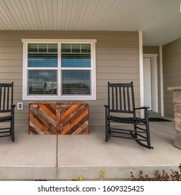 Square Two Rocking Chairs On A Covered Patio