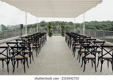 square wedding arch on the terrace