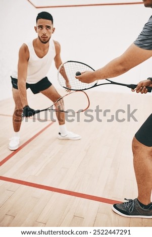 Squash, people and racket serve on court, competition and team for indoor fitness or tournament. Men, friends and gym for physical training or workout, practice sports and athletes for exercise