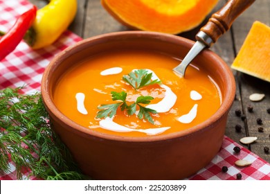 Squash Soup In Rustic Bowl