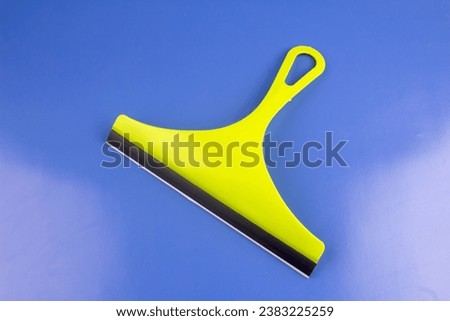 A squeegee for cleaning mirror