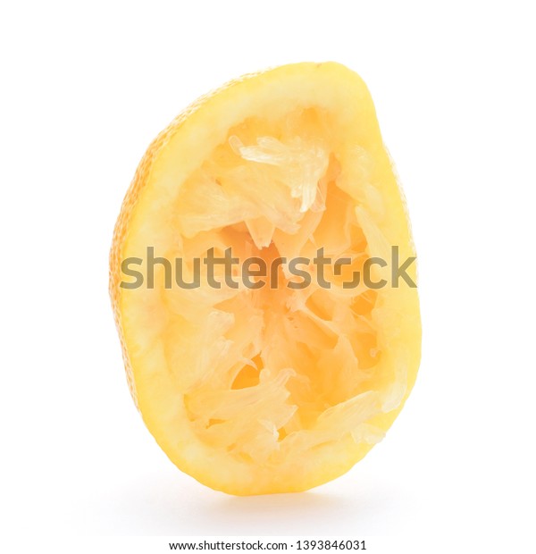 Squeezed lemon closed up isolated on white