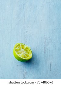 Squeezed lime on table