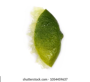 Squeezed lime slice isolated on white background, top view