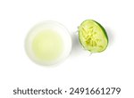 Squeezed lime, squeezing out half green lemon, squeezed lime juice on white background, burnout symbol, making a Cuba Libre cocktail