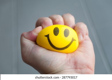 squeezing stress ball - Shutterstock ID 287793017