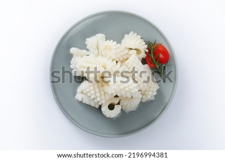Squid, pineapple cut isolated on white background