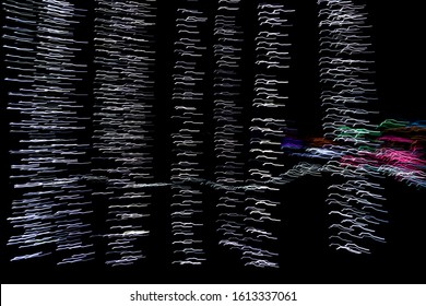 Squiggly lines of light in an abstract pattern