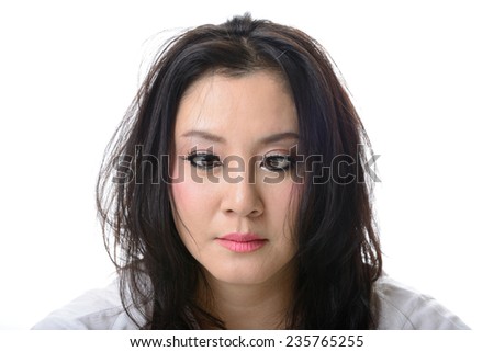 squint eyed crazy asian woman isolated on white