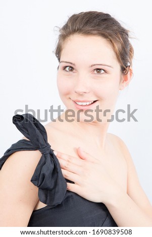 squint eyed woman with fashion party dress isolated on white background