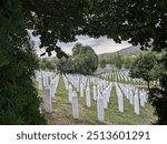 The Srebrenica Genocide Memorial, officially known as the Srebrenica–Potočari Memorial and Cemetery to honour the Victims of the 1995 Genocide. Massacre by Serbian army, killing Muslim Bosnians. 