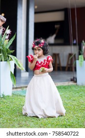 SRI LANKA - OCTOBER 26, 2017: Sri Lankan Child In Traditional Dress In Garden