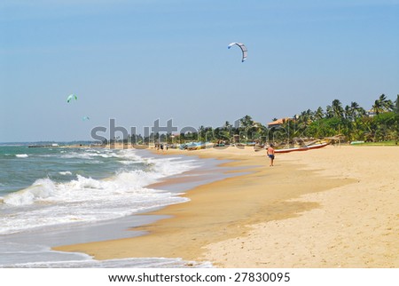 Sri Lankan tropical beach with people