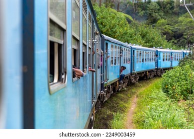 Sri Lanka's most beautiful train journey. A bucket list adventure for many visitors. Blue locomotives of Ceylon railways going in the jungle. - Powered by Shutterstock