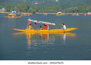 Srinagar, India - june 09, 2015 : Lifestyle in Dal lake, local people use Shikara, a small boat for transportation in the lake of Srinagar, Jammu and Kashmir state, India
