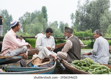 SRINAGAR , INDIA on 22 JULY 2018  morning floating vegetable market - Sellers gathered to sell their vegetables in floating market at Dal Lake,  SriNagar, India
