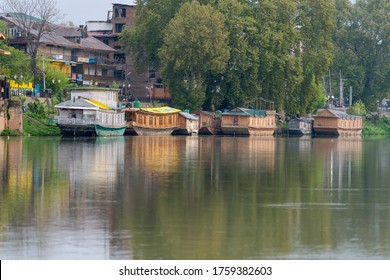 Srinagar, Jammu and Kashmir, India - April 15, 2019 : Houseboat in the river is highlight destinations of tourism are overnight stay famous place main attractions at Srinagar, Jammu and Kashmir, India