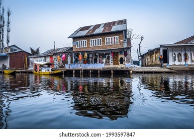 Srinagar, Kashmir, India - January 29, 2021 : Local shop on the shore of Dal Lake, Srinagar, Kashmir, India.