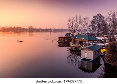 Srinagar, Kashmir, India - January 29, 2021 : A sunset view of Nigeen Lake in winter season, Srinagar, Kashmir, India.