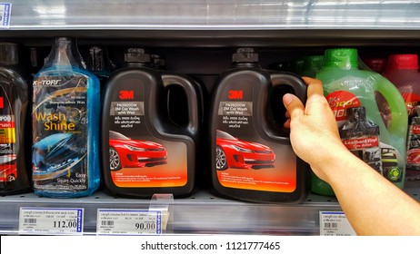 Sriracha, Chonburi THAILAND June 24, 2018: Man's Hands Are Holding Car Wash With Wax Brand 3M In Hardware Stores. To Clean His Car.