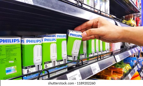 Sriracha, Chonburi THAILAND Sep 18, 2018: Man's Hand Is Holding Lamp Box (philips Brand) From Supermarket Shelf