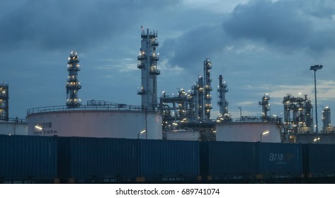 Sriracha, Chonburi-Thailand, Aug 04 '20017:The Railway Carriage Container In The Twilight Morning With Nearby Oil Refinery At Sriracha In Thailand.