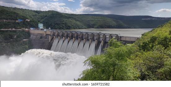 Srisailam Dam, Andhrapradesh / India - Dec 15, 2019 : Dam on Krishna River flowing between Andhra  and Telangana. 9 Gates of the Dam were open. 
