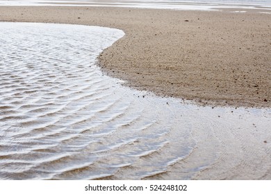 S-shaped sandy beach