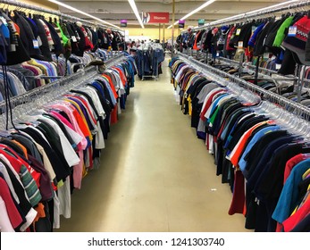 St. Albert, Alberta, Canada - November 25th, 2018: A Colourful Row Of Shirts For Sale At The Local Value Village, One Of The Most Popular Thrift Stores To Find All Sorts Of Used Goods.