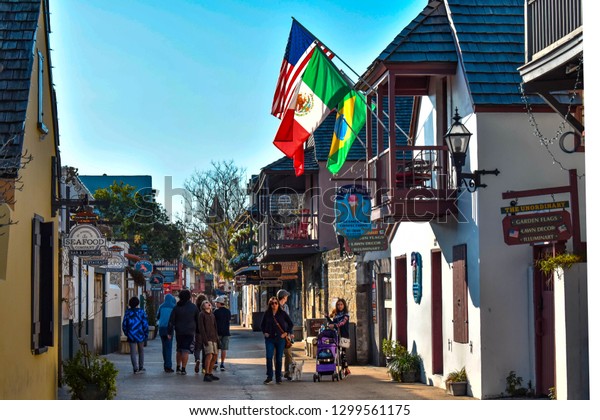 St. Augustine, Florida. January 26 , 2019 .\
People enjoying colonial experience in St. George St. in Old Town\
at Florida\'s Historic Coast \
